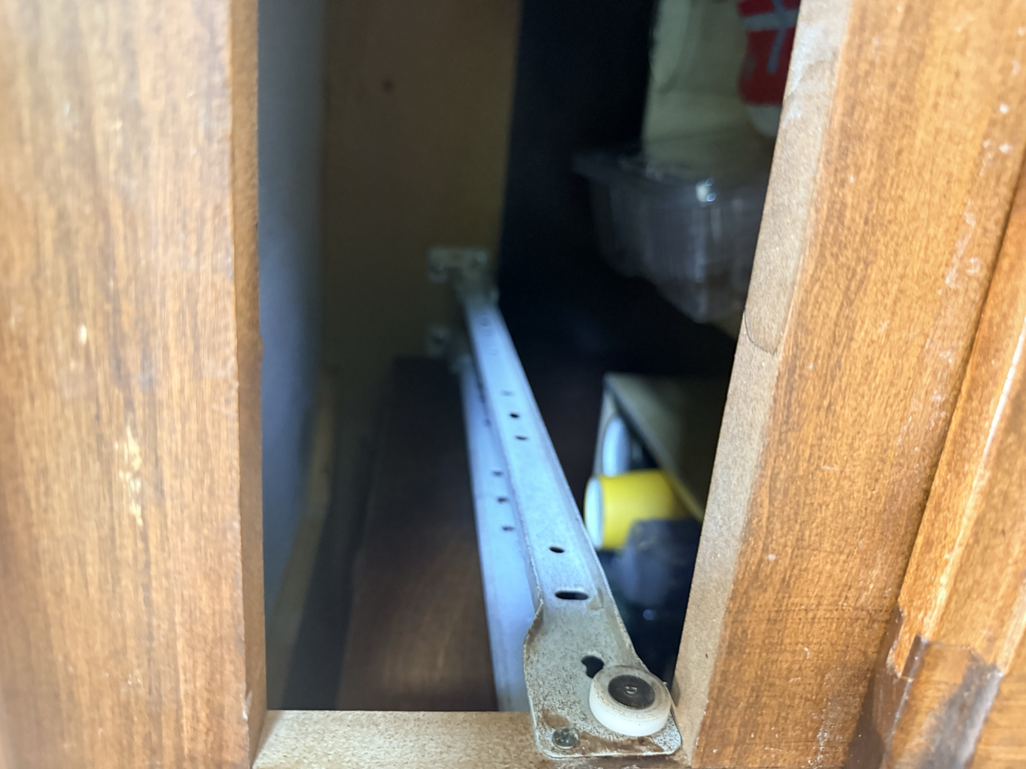 Worn builder grade drawer slides before upgrade